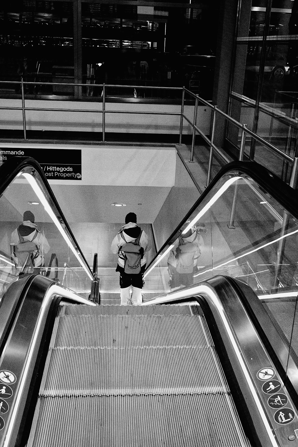 Escalator figure — In Transit